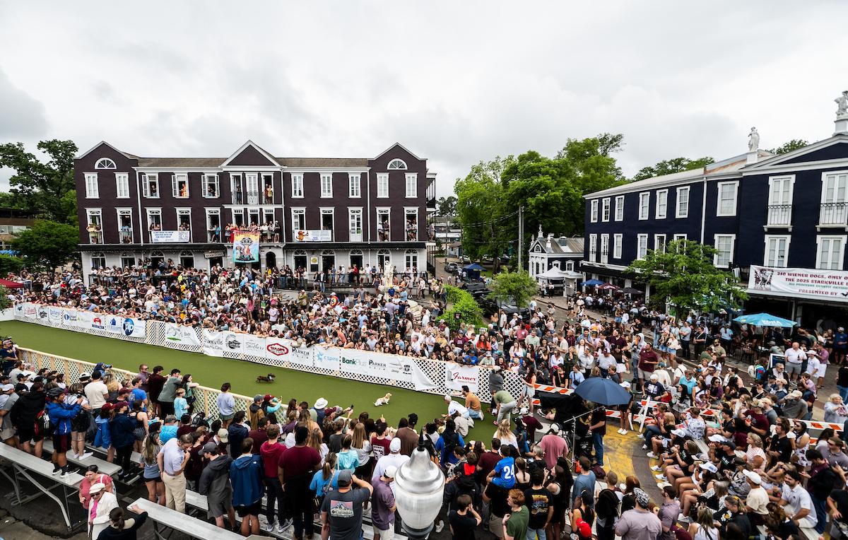 Crowds line the race course at the Starkville Derby in the Cotton District